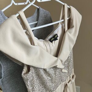 Elegant beige jumpsuit, split legs with stretch shorts